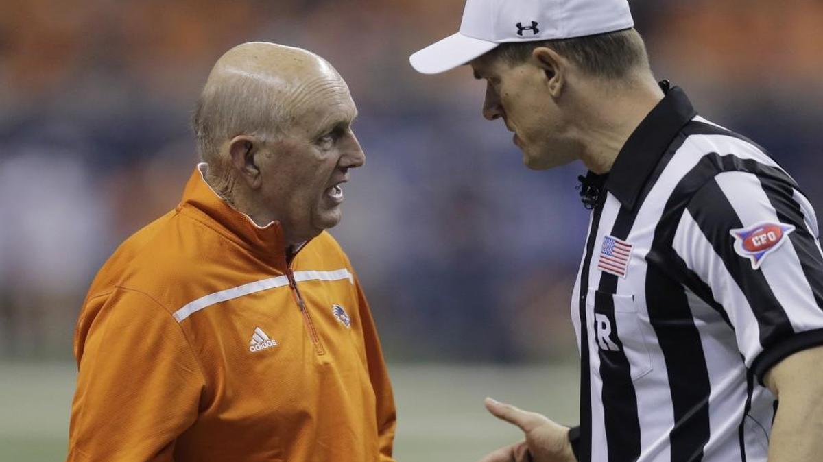 
Texas-San Antonioa head coach Larry Coker talked with an official during Saturday’s game.
