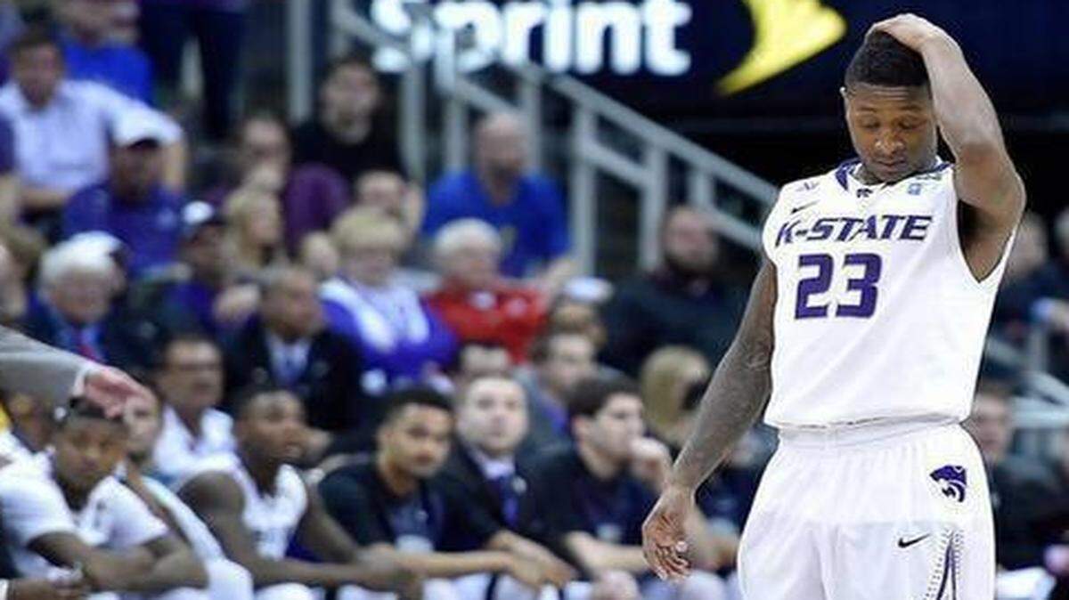 
After the Wildcats’ last shot at beating TCU clanked off the iron, Kansas State’s Nigel Johnson walked to the other end of the court, knowing that the Wildcats’ run in the Big 12 Tournament was over. 
