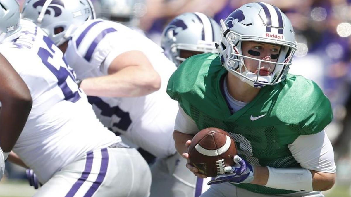 Joe Hubener (right) had a big day at quarterback during Kansas State’s spring game on Saturday in Manhattan, Kan.