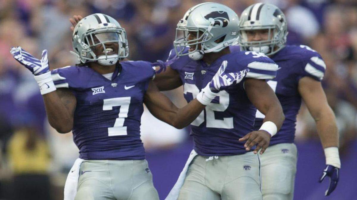 
Kansas State defensive back Danzel McDaniel left) celebrated with teammates after knocking the ball loose during a game last September in Manhattan, Kan.
