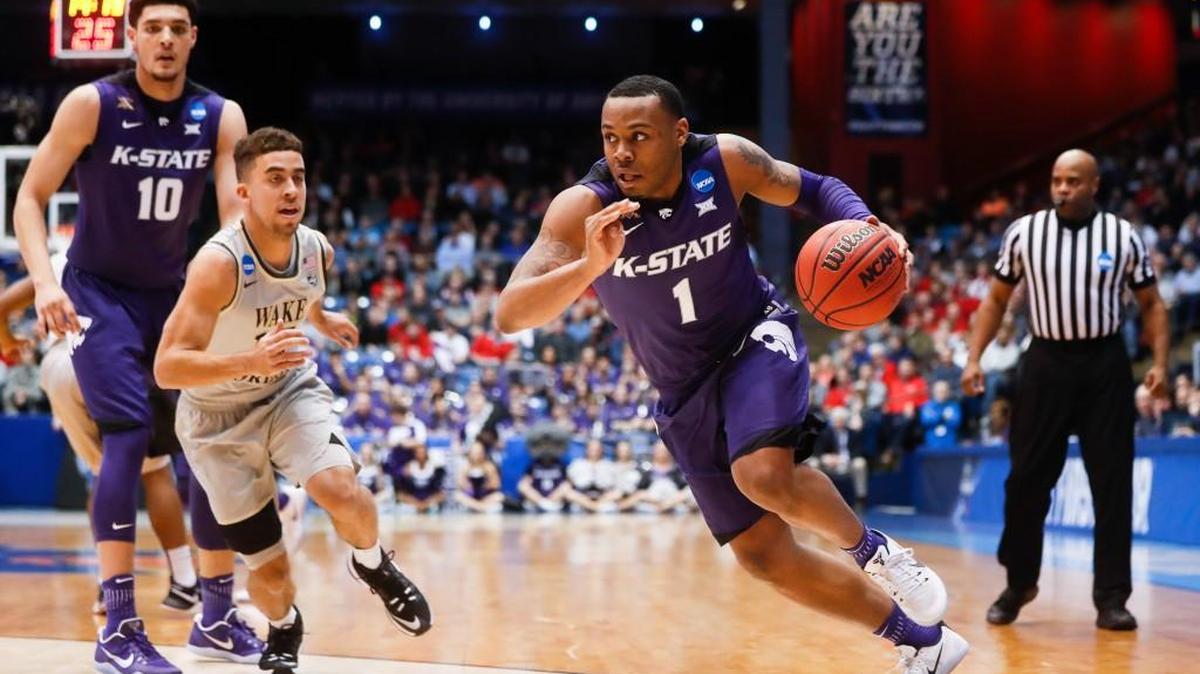 Kansas State’s Carlbe Ervin drives past Wake Forest’s Mitchell Wilbekin in the first half Tuesday night in Dayton, Ohio. The Wildcats traveled across three time zones for the first-round game Friday against Cincinnati.