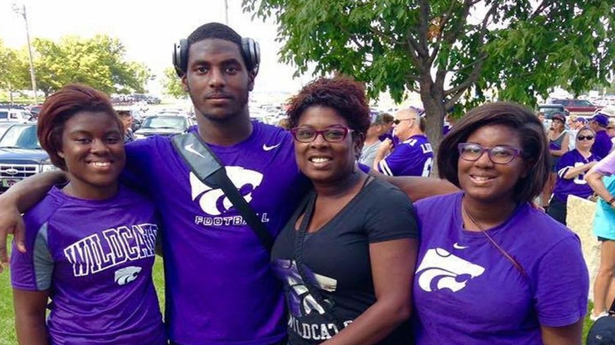 
From left: Arica Lee, Elijah Lee, ShaRon Lee and Aliyah Lee pose for a photo after a K-State football game. 
