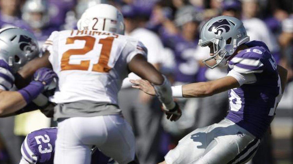 
Kansas State kicker Matthew McCrane kicks a field goal against Texas. (AP Photo/Orlin Wagner)
