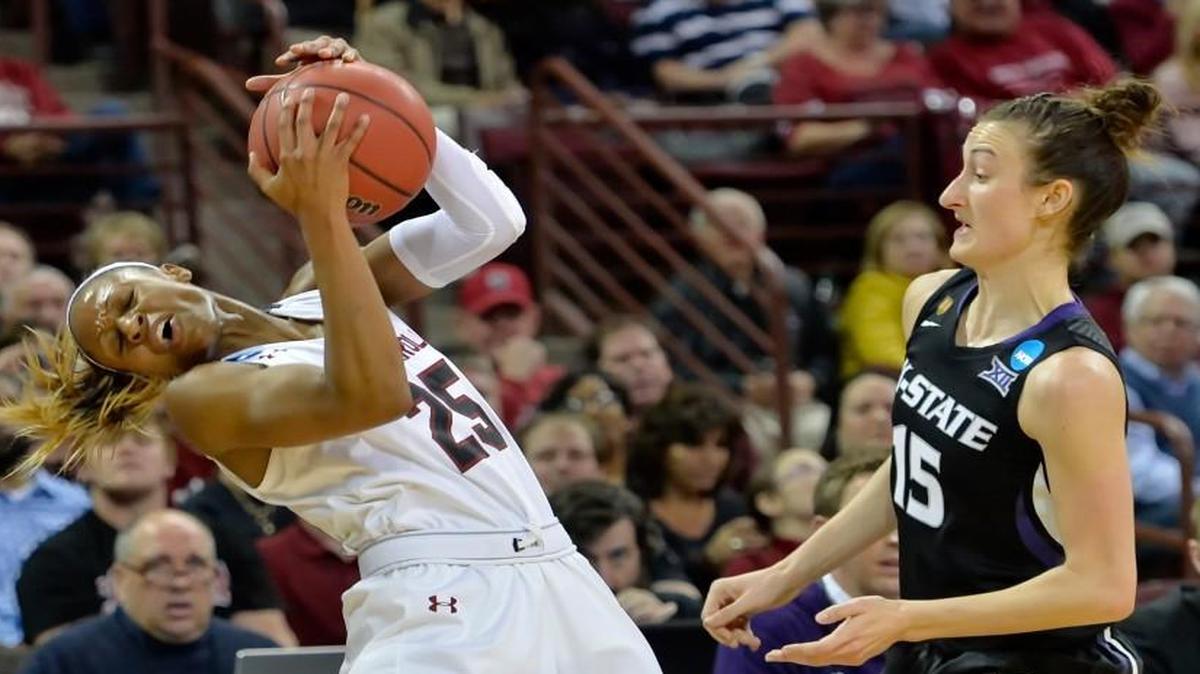 South Carolina’s Tiffany Mitchell (left) was fouled by Kansas State’s Megan Deines in their game Sunday in Columbia, S.C. Mitchell finished the game with 20 points.