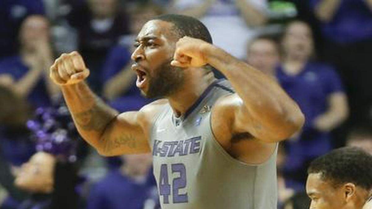 
Kansas State's Thomas Gipson flexes his muscles after the Wildcats took a lead against Oklahoma State last season.
