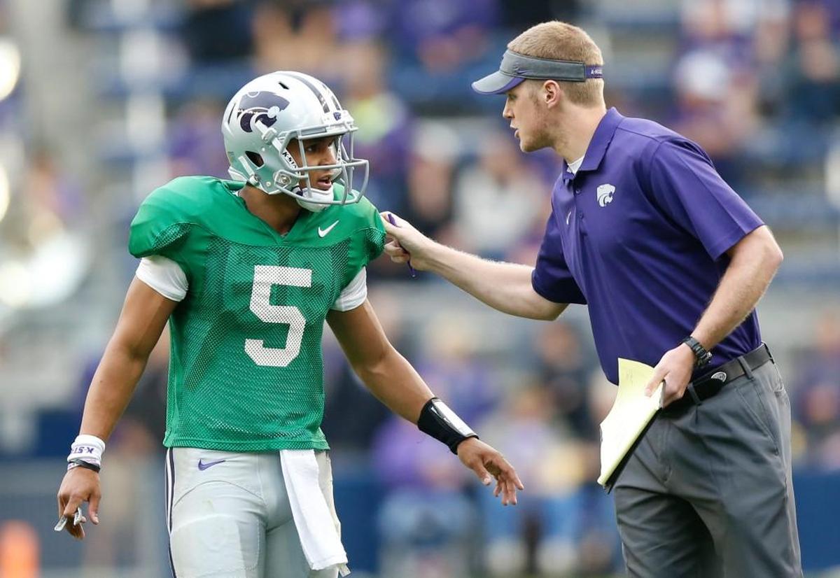 Collin Klein, at right in 2017 during his time as a K-State assistant coach.