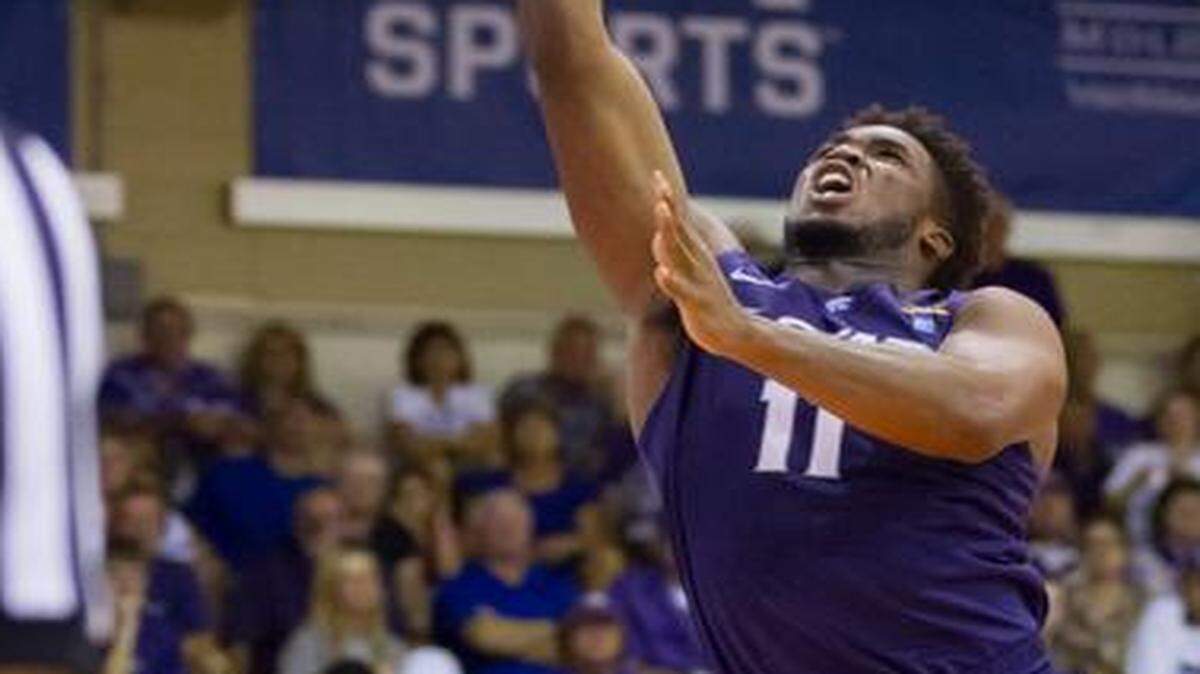 
Kansas State forward Nino Williams (11) made a layup as Pittsburgh guard James Robinson looked on in the second half of the third-place game Wednesday at the Maui Invitational in Lahaina, Hawaii. The Panthers beat the Wildcats 70-47.
