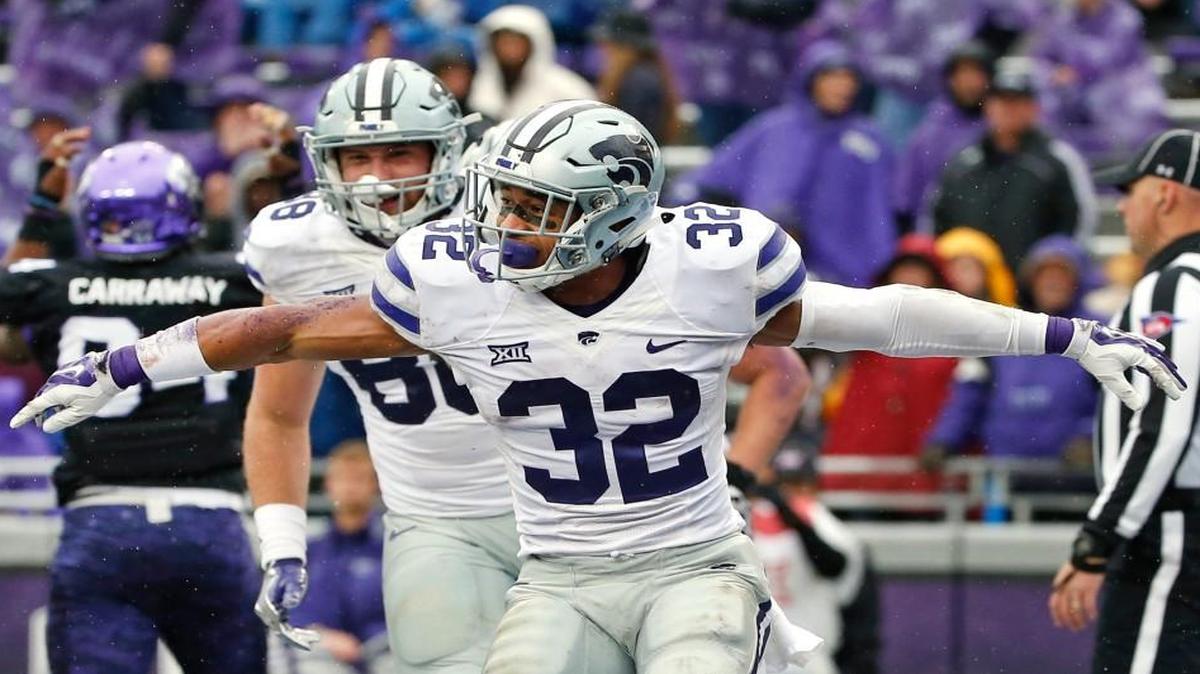 Kansas State running back Justin Silmon and teammate Dayton Valentine celebrated a touchdown.