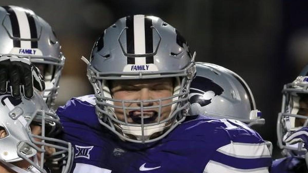 Kansas State’s Scott Frantz (right) celebrated a touchdown with his teammates during a game last September.