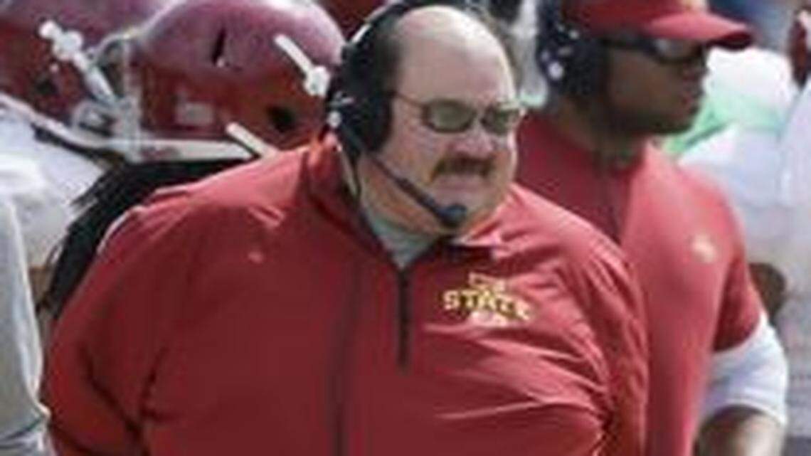 
Iowa State offensive coordinator Mark Mangino, center, looks on during Iowa State's annual spring football game in April.
