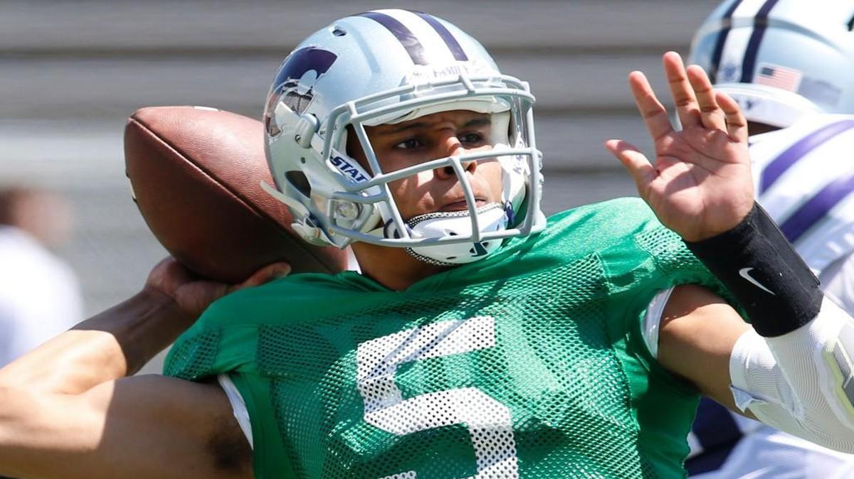 K-State quarterback Alex Delton prepares to fire off a long pass during the spring game in April.