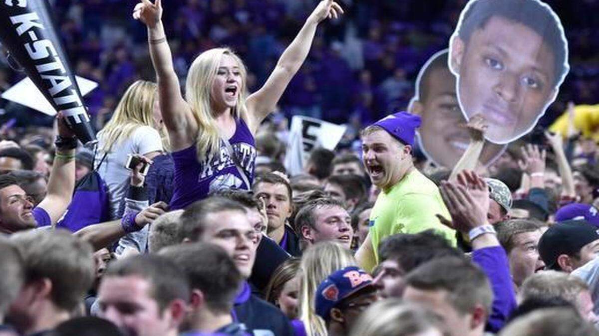 
Kansas State students celebrated the Wildcats’ 70-63 win over No. 8 Kansas on Monday night in Manhattan, Kan.
