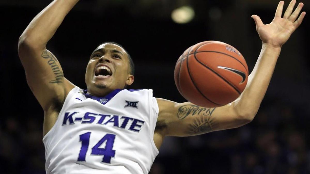 Kansas State guard Justin Edwards, who followed through on a dunk during a game this season, thinks there is time for the Wildcats to get things turned around.