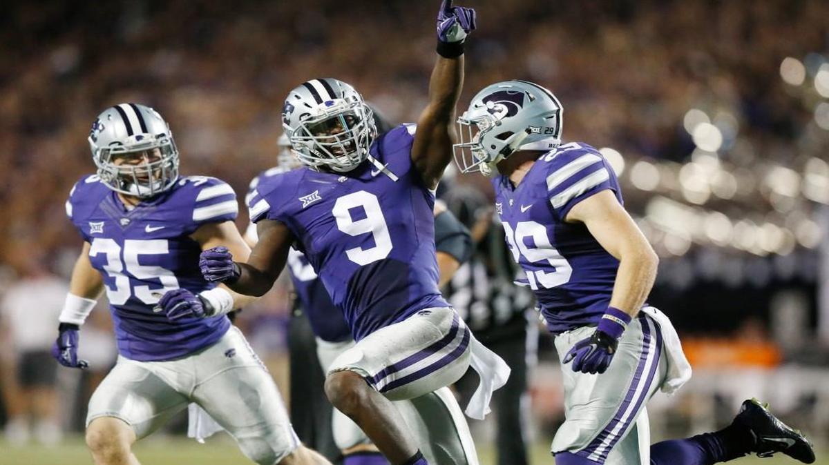 
K-State linebacker Elijah Lee celebrates an interception Saturday night against TCU.
