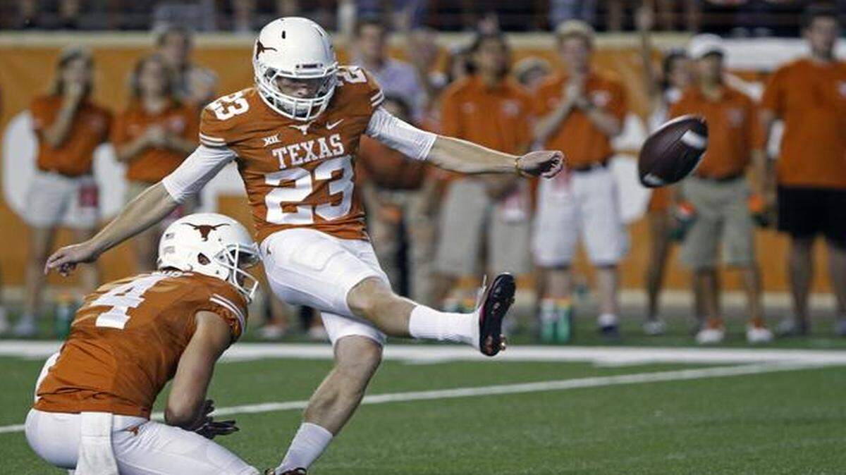 
In this file photo, Texas kicker Nick Rose kicks a winning field goal against Iowa State. The Dallas Cowboys are bringing Rose in for a tryout on Monday, Dec. 9.