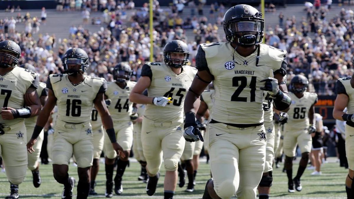 Vanderbilt defensive back Donovan Sheffield (21) and teammates take the field for an NCAA college football game against Alabama A&M Saturday, Sept. 9, 2017, in Nashville, Tenn. (AP Photo/Mark Humphrey)
