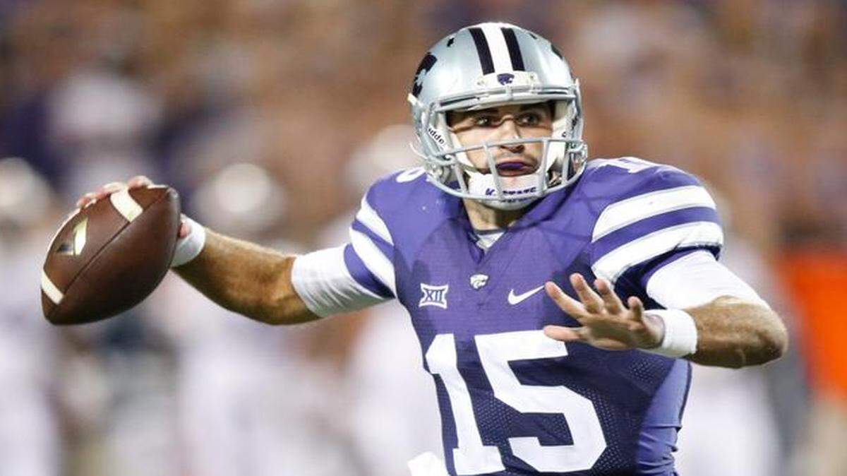 
K-State quarterback Jake Waters looks down field for a receiver in the 2nd half against Auburn (September 18, 2014)

