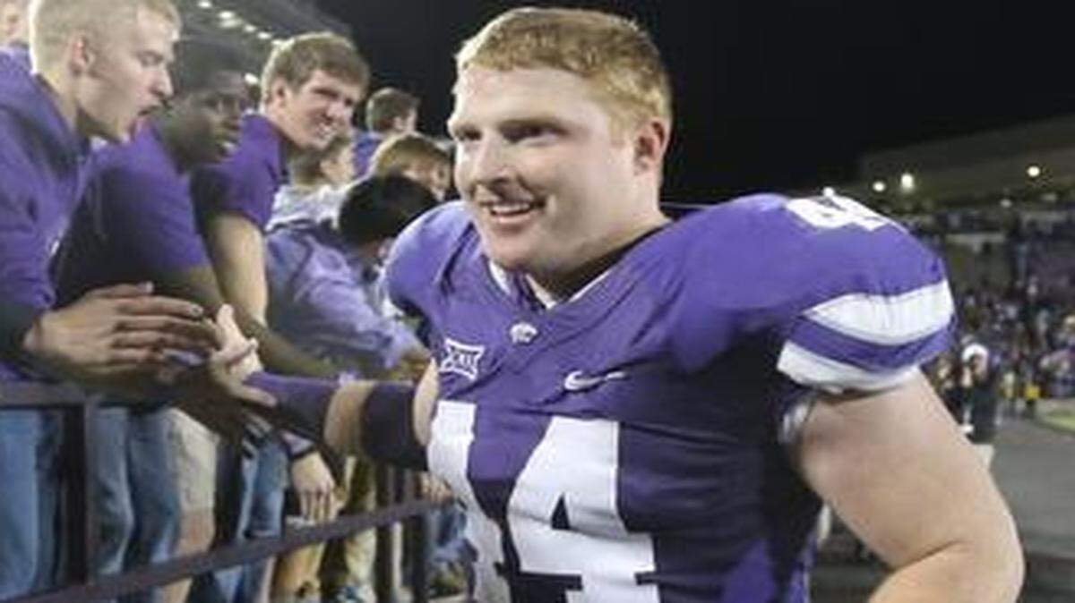 
Former Kansas State defensive end Ryan Mueller (44) of Leawood and St. Thomas Aquinas is trying to make the transition to outside linebacker in the NFL. He can help his cause with a strong showing at K-State’s pro day on Tuesday.
