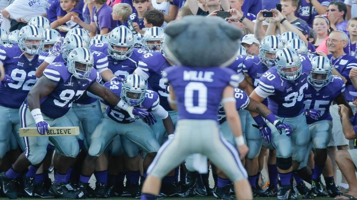 The Wildcats prepare to take the field at Bill Snyder Family Stadium.