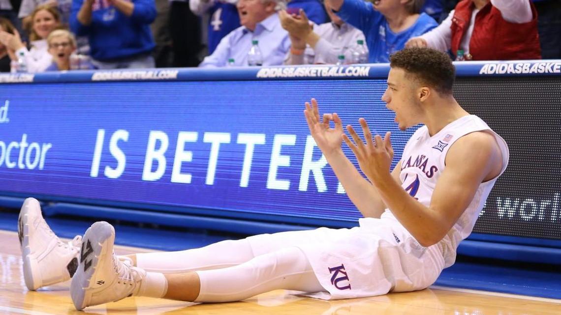Kansas guard Brannen Greene celebrates a three-pointer and a foul with less than 10 seconds to go in the first half against Kansas State at Allen Fieldhouse.