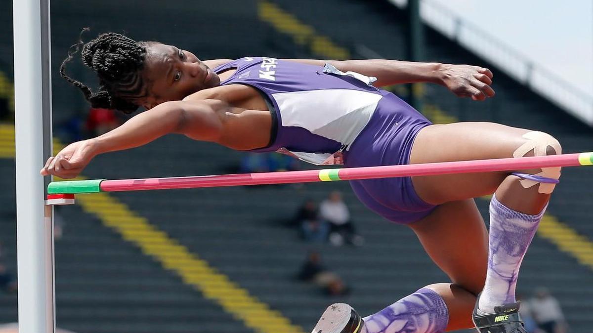 Akela Jones clears the bar while competing for Kansas State.