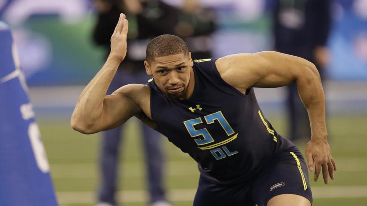 Kansas State defensive end Jordan Willis ran a drill Sunday at the NFL Combine in Indianapolis.