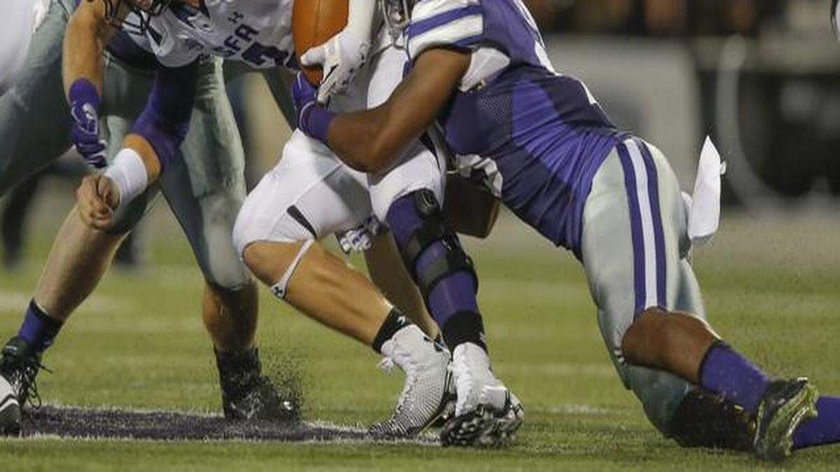 
Kansas State’s Randall Evans tackles Stephen F. Austin quarterback Zach Conque during the third quarter of their game on Saturday at Bill Snyder Family Stadium.
