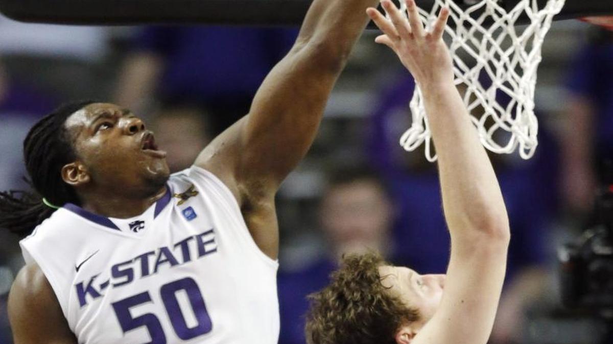 Kansas State forward D.J. Johnson blocked a shot by TCU guard Hudson Price during a game on Feb. 19, 2014.