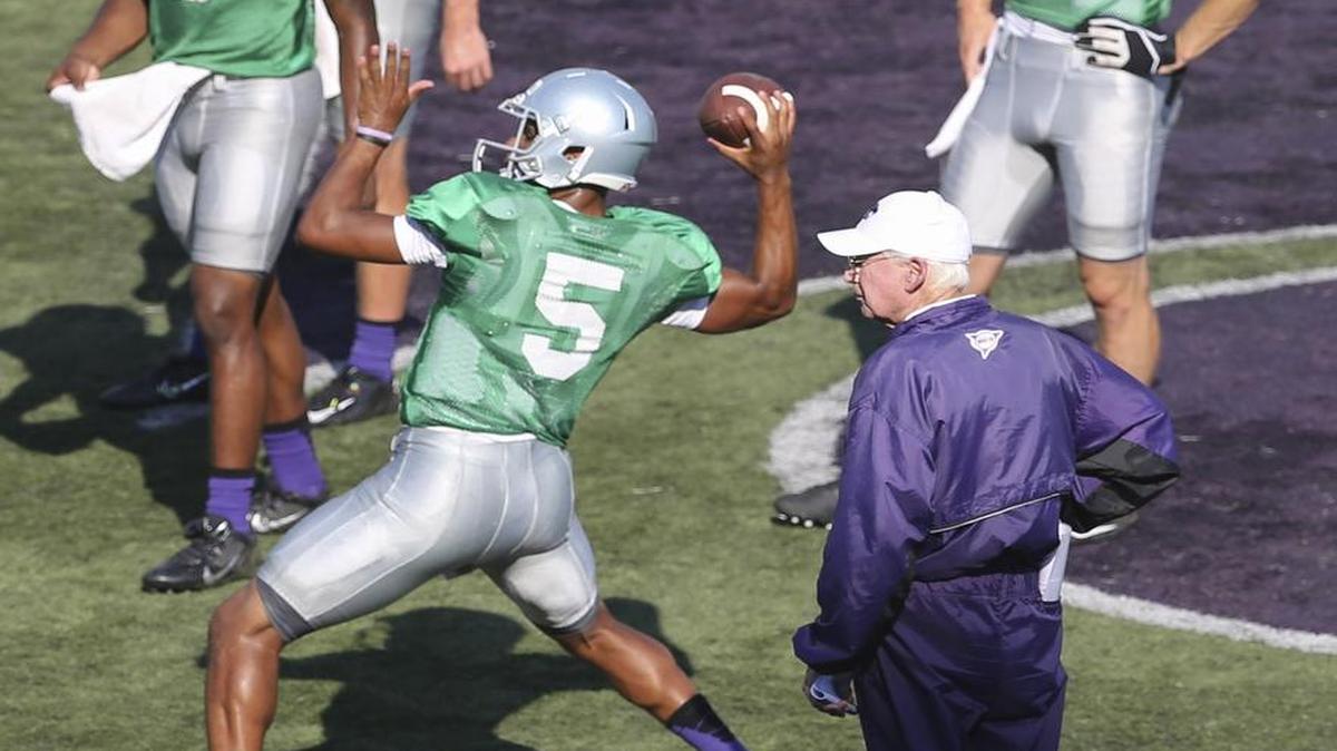 
Kansas State coach Bill Snyder watches his four quarterbacks, all of whom are competing for the starting job, during an open practice in Manhattan.

