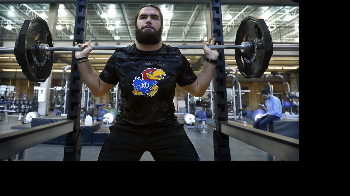 
Ben Heeney, a former linebacker on the Kansas football team, has been working out in Lawrence under the supervision of Andrea Hudy, the strength coach for the men’s basketball team.
