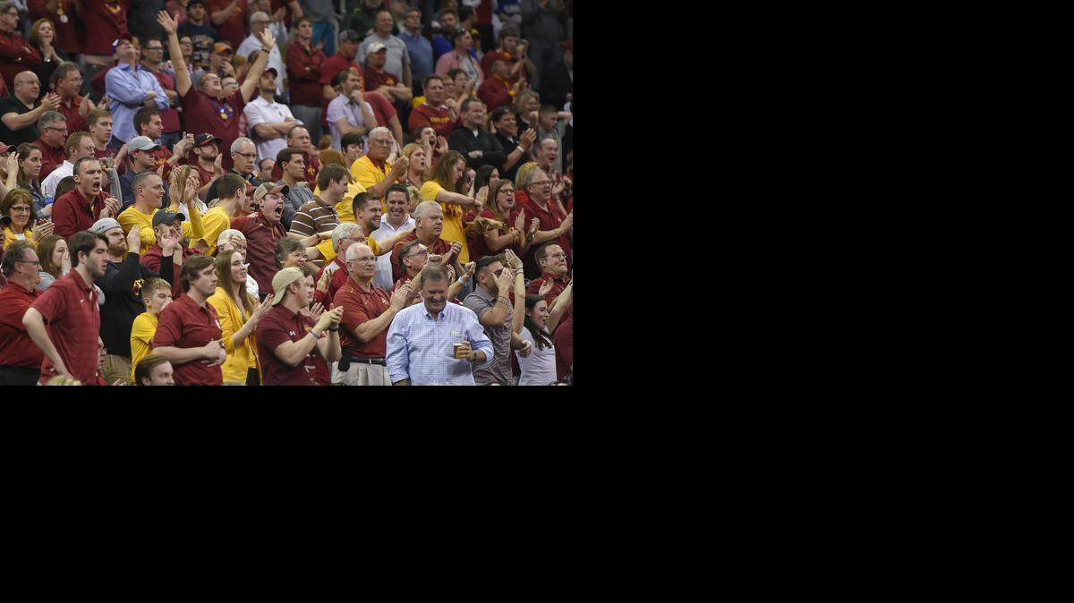 
The Iowa State Cyclones fans went wild after the Cyclones tied the score late in the first half against the Oklahoma Sooners Friday evening, March 13, 2015 at the Big 12 Men's Basketball Championship Tournament at Sprint Center in Kansas City, Mo. The halftime score is 29-29.
