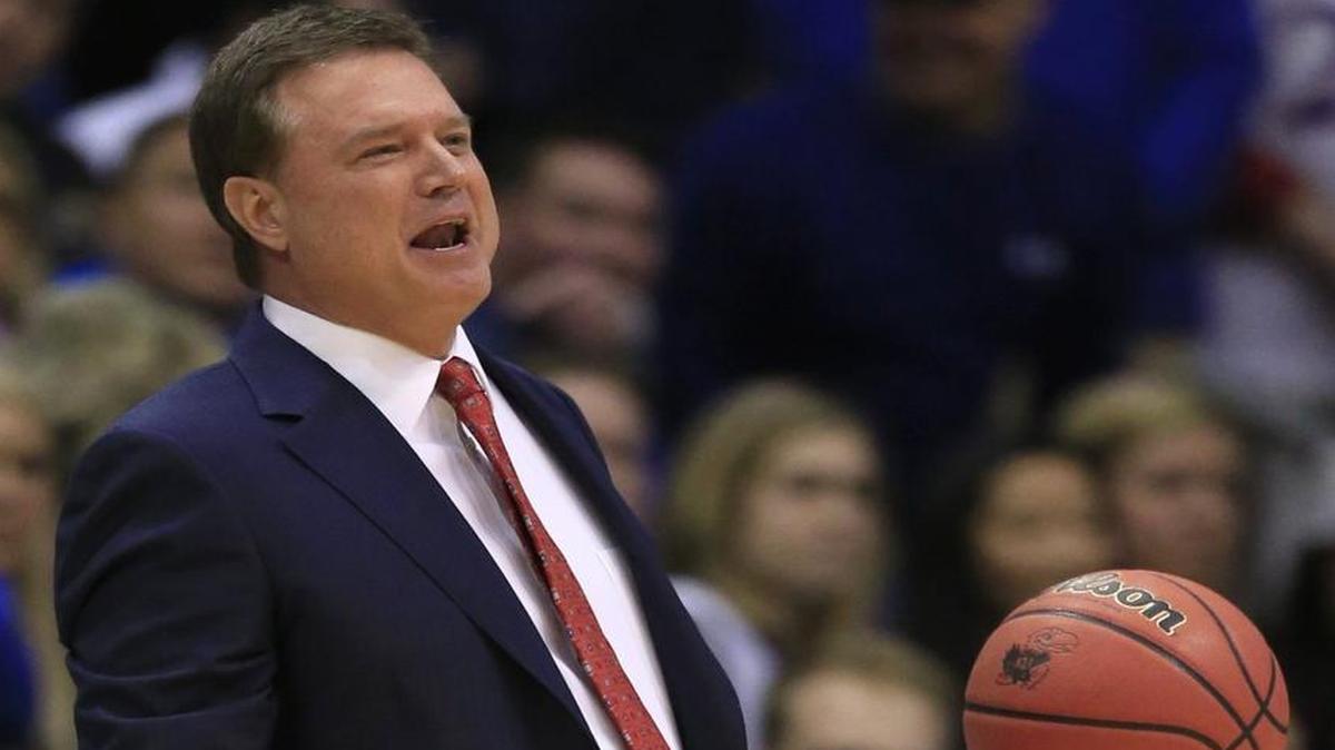 Kansas head coach Bill Self held the ball during the first half of Saturday’s game against Texas.
