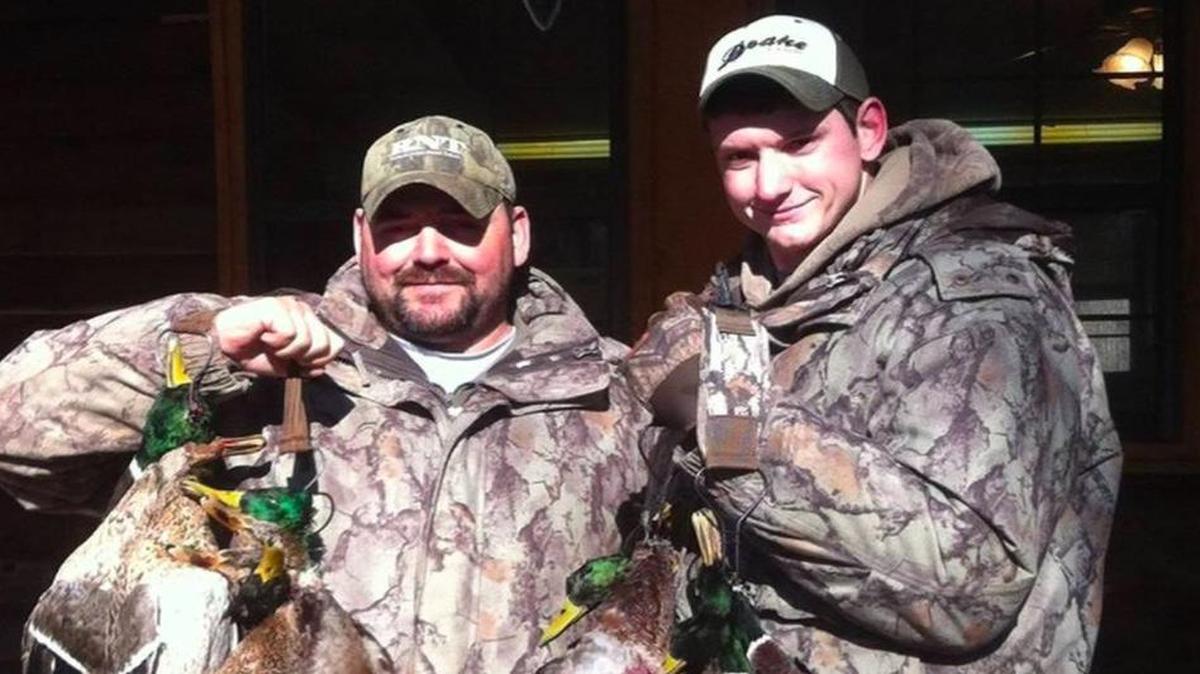 Hunter Mickelson (right) with his father, Darien.