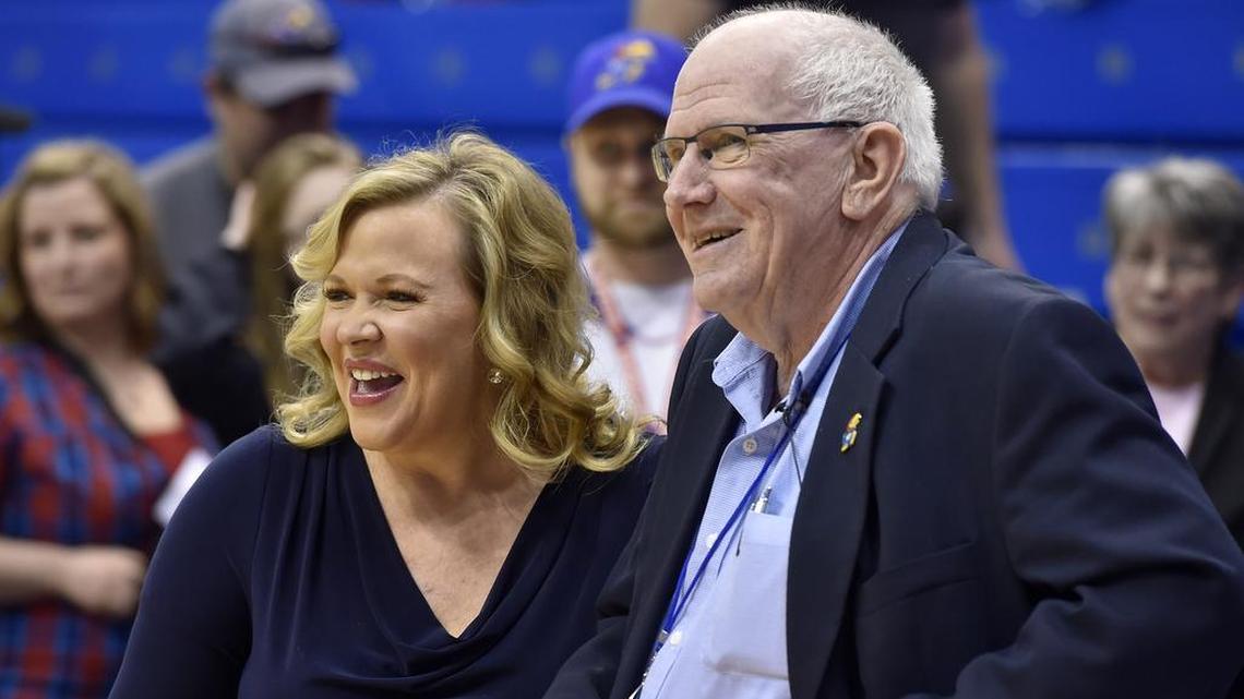 The legendary Bob Davis, who has been the radio voice of the Jayhawks for 32 years, shares a laugh with ESPN commentator Holly Rowe, before the Jayhawks final home game of the season Saturday against Iowa State. Davis is calling it quits after this season.
