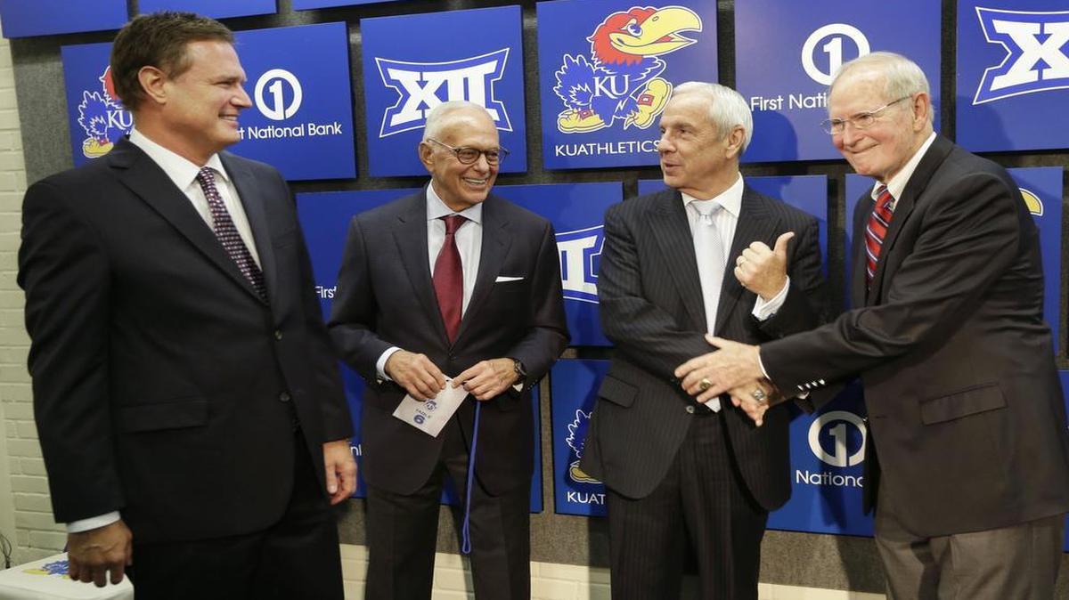 Kansas basketball coach Bill Self, from left, talks with former Kansas coaches Larry Brown, Roy Williams and Ted Owens following a news conference for the 60th anniversary of Allen Fieldhouse in Lawrence, Kan., Monday, Oct. 27, 2014.