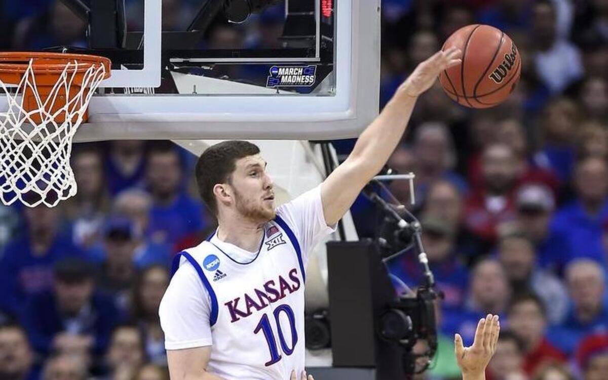 Kansas Jayhawks guard Sviatoslav Mykhailiuk blocked a shot by Oregon forward Dillon Brooks in the first half in the Midwest Regional final at the Sprint Center.