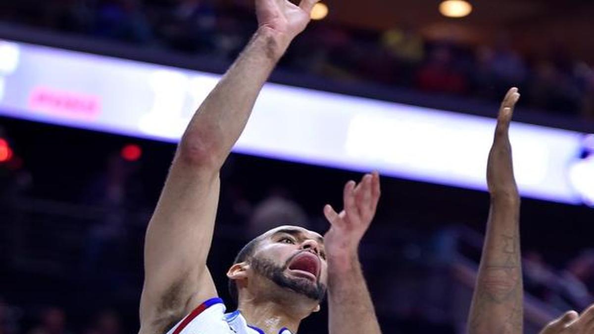 KU’s Perry Ellis scored 21 points after sitting out a short time when he was injured early in Saturday’s game against UConn.