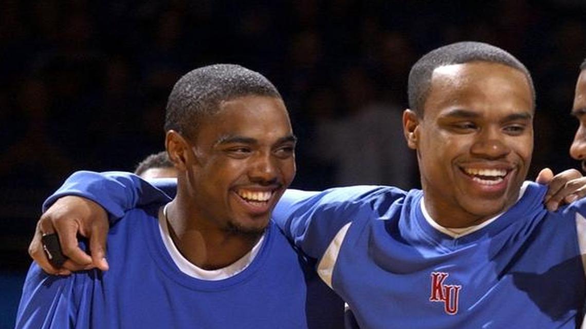 Former Kansas teammates Aaron Miles (left) and Michael Lee (second from left) will be coaching together.