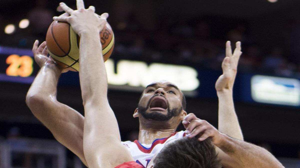 
KU forward Perry Ellis (34), shown here being fouled by Team Canada center Mikeal Andrews (15) during last month’s exihibition game at the Sprint Center, scored 23 points to lead Team USA over Russia 78-68 Sunday in the World University Games semifinal basketball game in South Korean.
