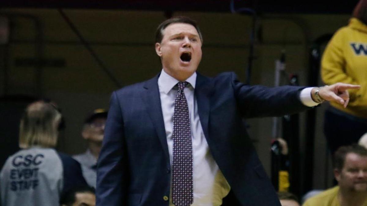 Kansas coach Bill Self gives instructions to his players during the first half against West Virginia on Tuesday in Morgantown, W.Va.