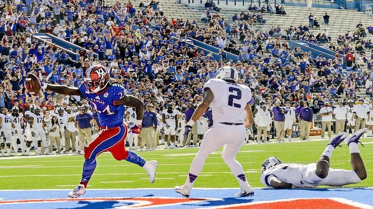 Kansas running back Taylor Martin scored a touchdown against TCU last season at Memorial Stadium, where KU Athletics has plans for a $300 million renovation.