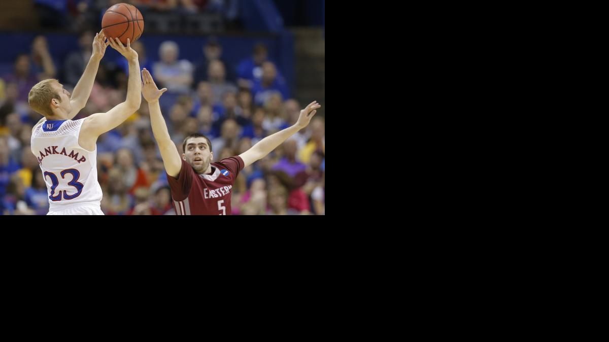 
Kansas’ Conner Frankamp shot against Eastern Kentucky’s Reese Morgan during the first half of their NCAA Tournament game in St. Louis.
