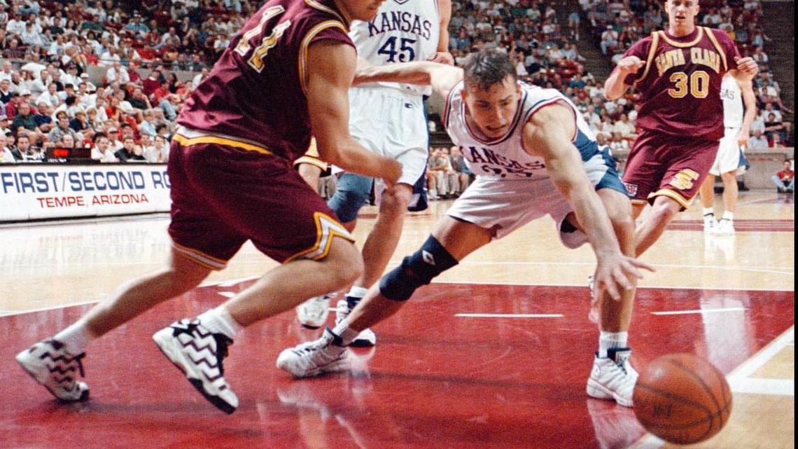 University of Kansas guard Jerod Haase, right, chasesd down a loose ball against Santa Clara senior guard Steve Nash, left, in the second half of Sunday's March 17, 1996, NCAA Tournament game in Tempe, Arizona.