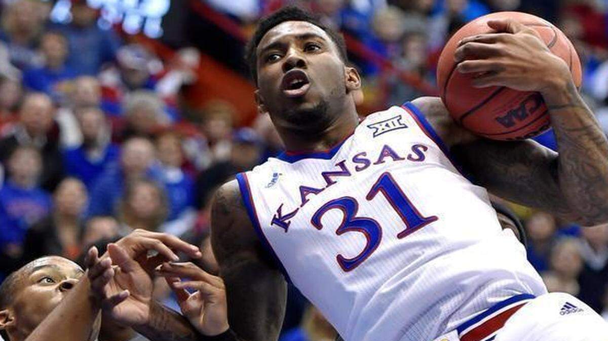 
KU's Jamari Traylor (31) yanks a rebound away from Baylor's Lester Medford during the first half of Saturday's game at Allen Fieldhouse, in Lawrence,.

