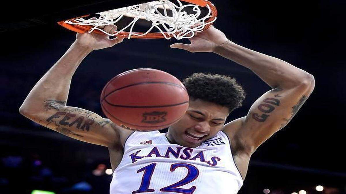 
KU's Kelly Oubre put an exclamation point on his game-high 25 points Thursday with this two-handed throw-down late in the Jayhawks’ 64-59 win over TCU at the Big 12 Tournament at the Sprint Center.
