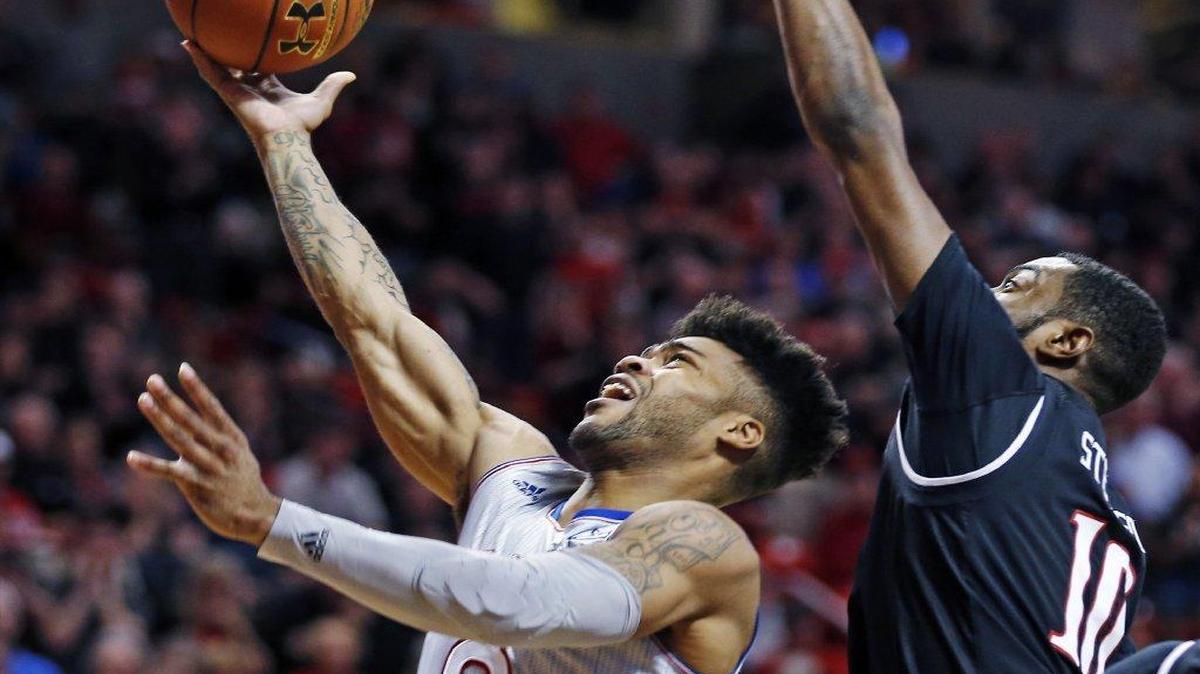 Frank Mason (left) leads KU in scoring with 20.1 points per game, but he had only 12 Saturday against Texas Tech.