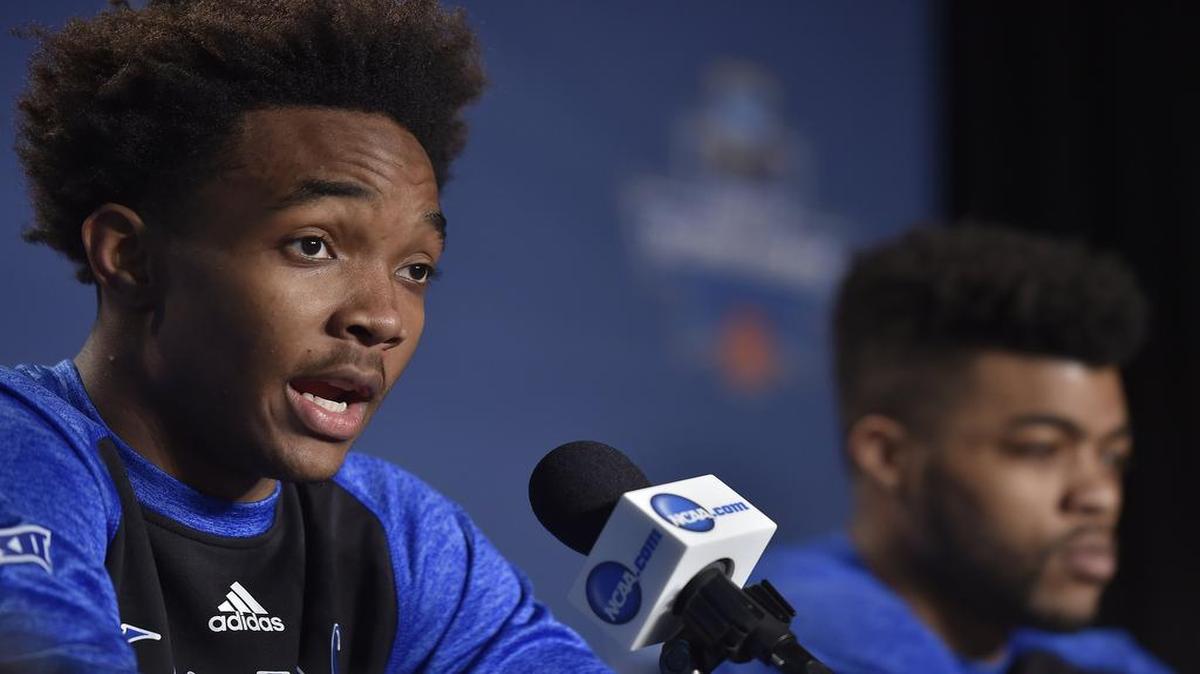 During a Saturday press conference, Devonte Graham (left) and teammate Frank Mason talked about the Jayhawks upcoming second-round game against Michigan State in the NCAA Tournament in Tulsa, Okla.