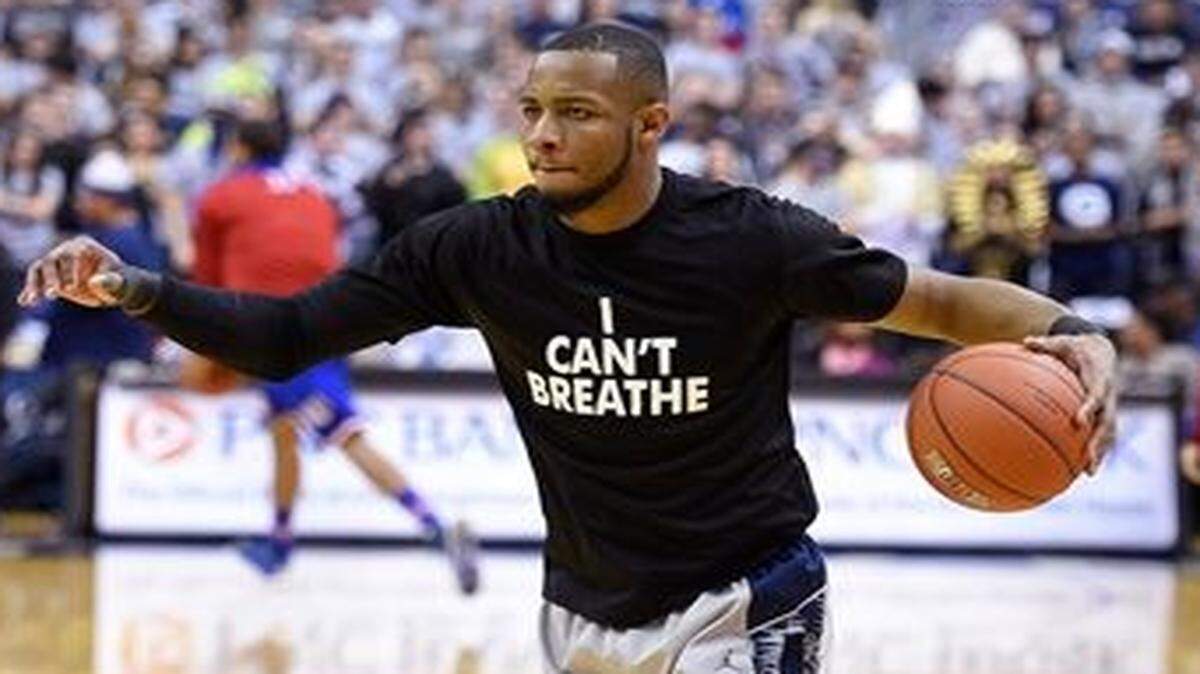 
Guard Jabril Trawick (left) and the other Georgetown players wore “I Can't Breathe” t-shirts during warmups before Wednesday’s game against Kansas.
