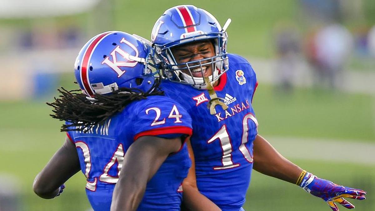 Kansas cornerback Marnez Ogletree (right) and his teammates have shown improvement defending the pass this season.