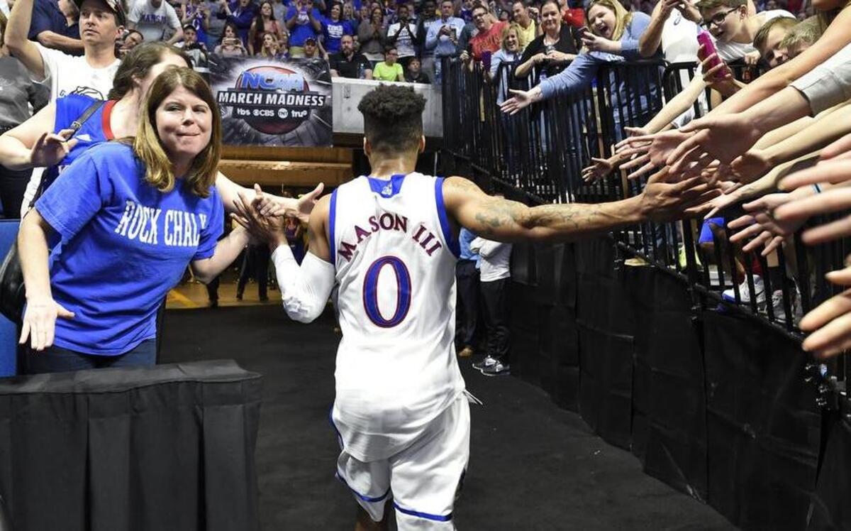 Frank Mason (center) will play in the “KU Barnstorming Tour” this May.